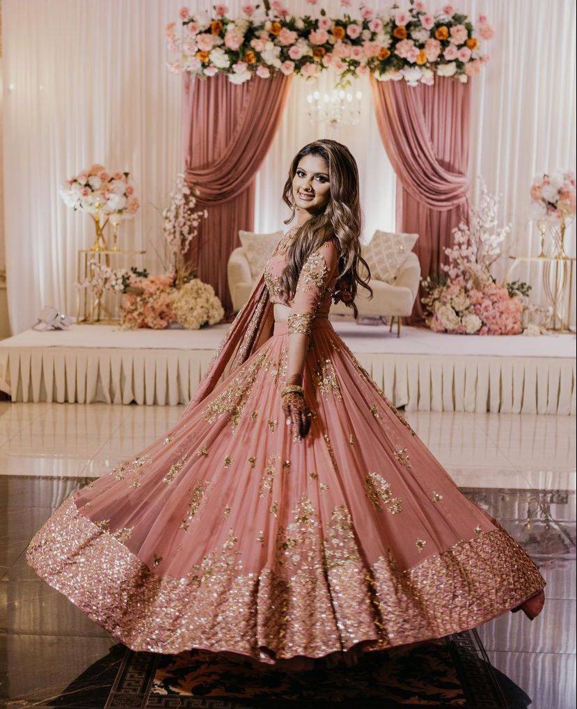 PEACH SEQUINS AND DORI EMBROIDERED SOFT NET FESTIVE & PARTY WEAR SEMI  STITCHED LEHENGA - Divine International Trading Co - 4071676