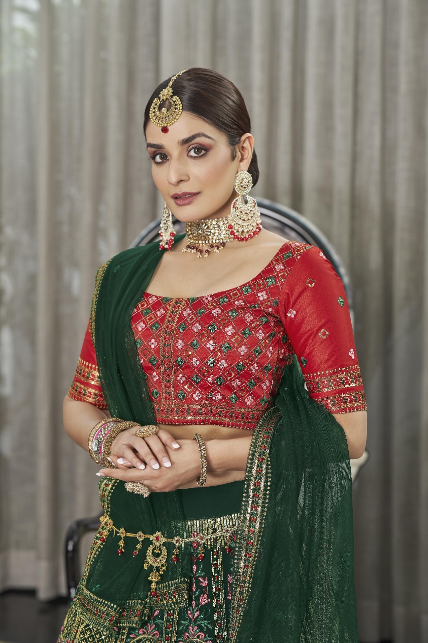 Photo of Colorblocked bridal lehenga in red green and yellow