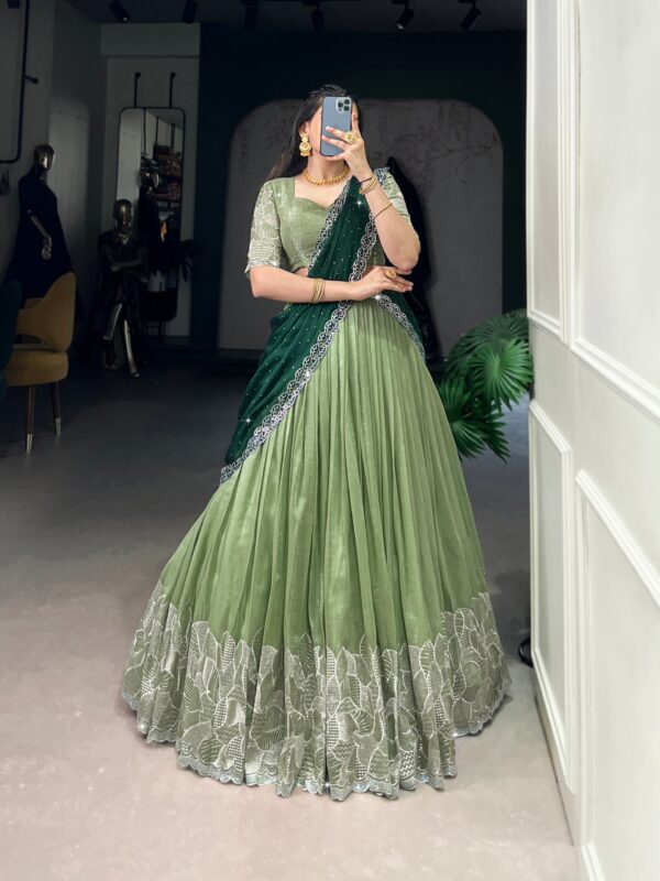Lehenga Collection Of 2025 With Glossy Fabric In Pista color.
