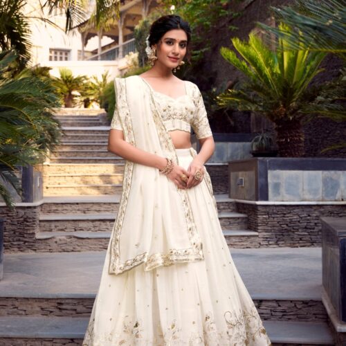 Lehenga Collection Of 2025 With Glossy Fabric In White color.