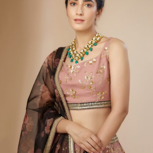 Luxurious Dusty Pink Lehenga Choli With golden sequins Work.