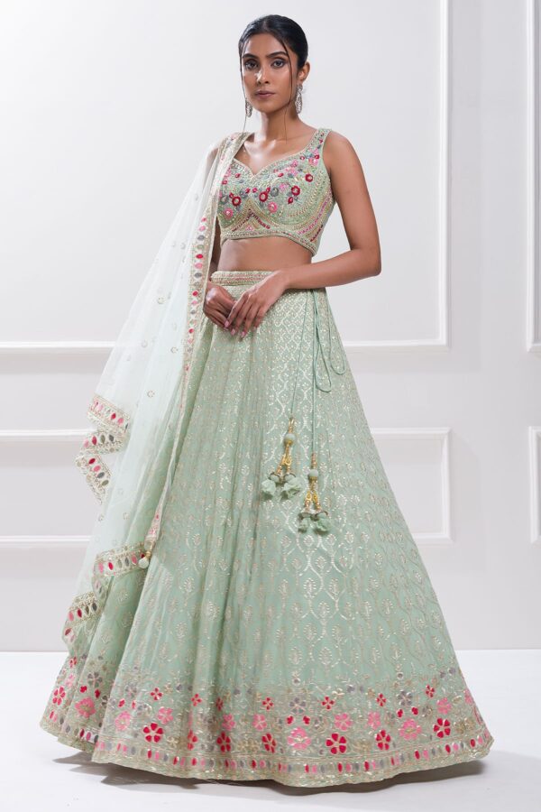 Luxurious Lehenga Choli With Real Mirror Work In Beautiful Pista Color.