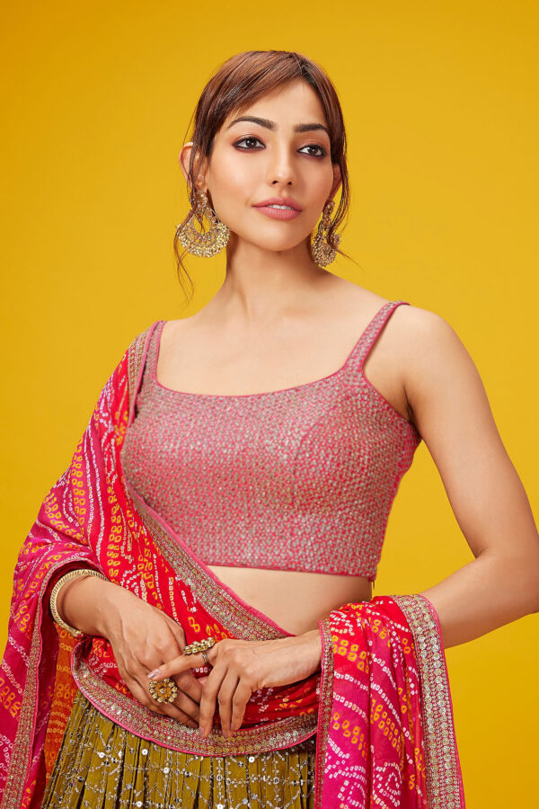 Luxurious Lehenga Choli With  golden sequins Work In Olive Color.