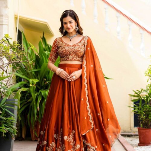 Rusty Color Wedding Lehenga Choli Collection With Sequins Work.