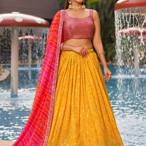 Sunlit Yellow Embroidered Lehenga with Pink Bandhani Dupatta.